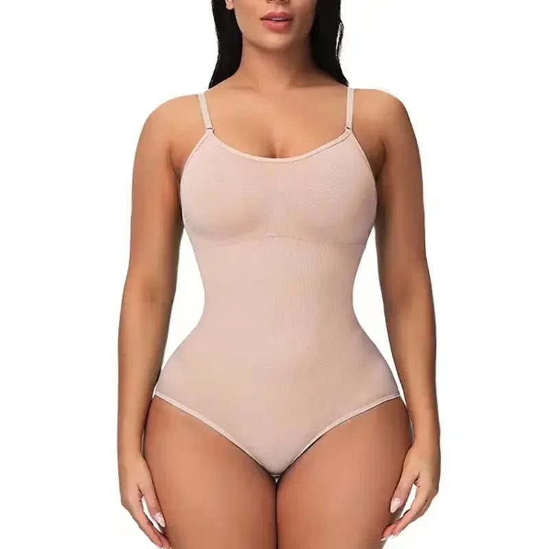 Beige bodysuit worn by a model on a white background