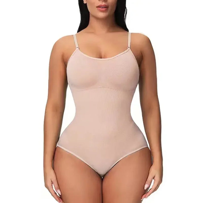 Beige bodysuit worn by a model on a white background
