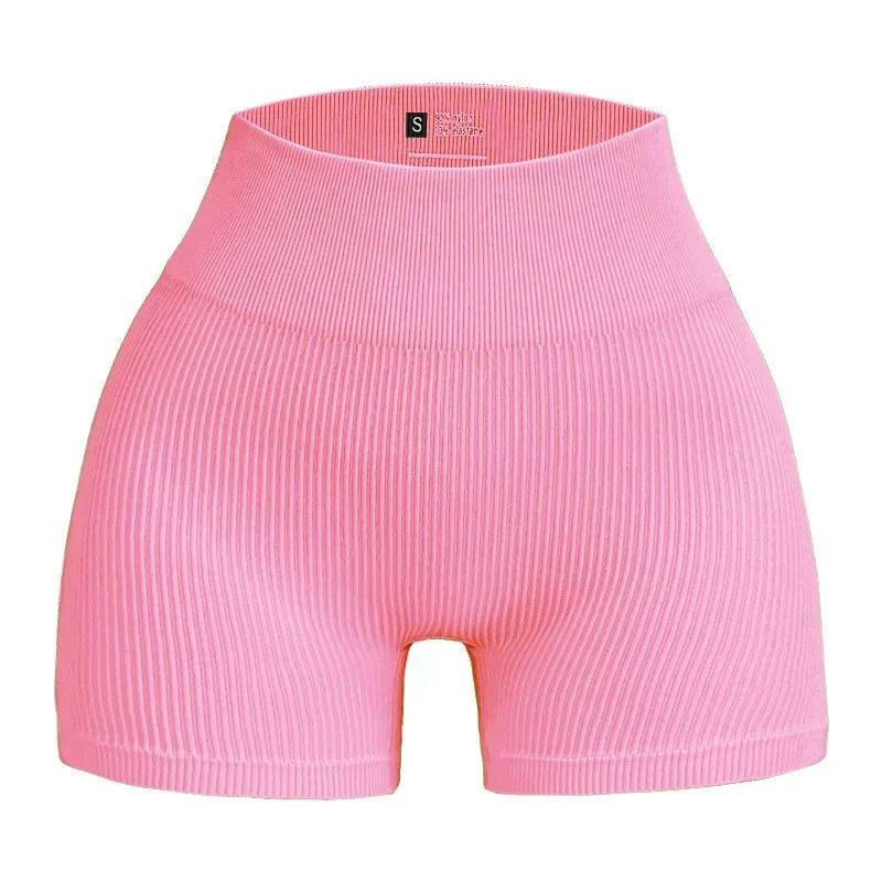 Pink ribbed shorts on a white background