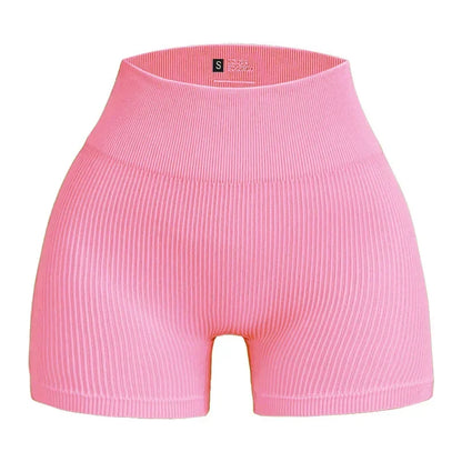 Pink ribbed shorts on a white background