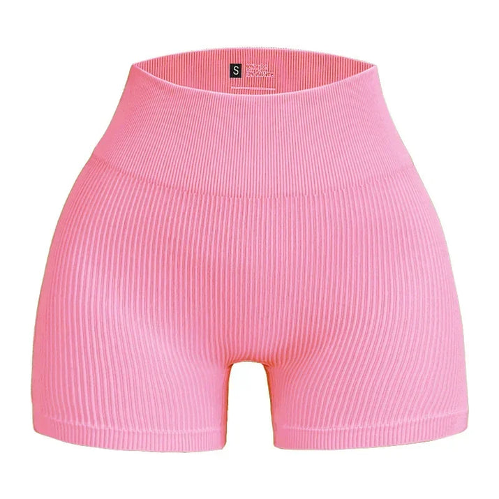 Pink ribbed shorts on a white background